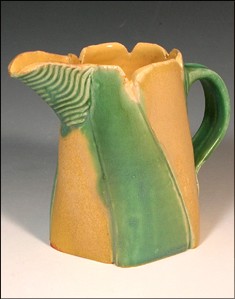 Yellow And Green Stoneware Pitcher