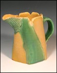 Yellow And Green Stoneware Pitcher
